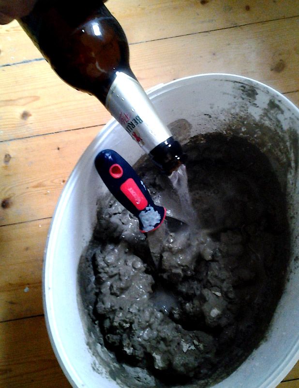 When mixing up tile adhesive, the critical ingredient is a half bottle of beer.